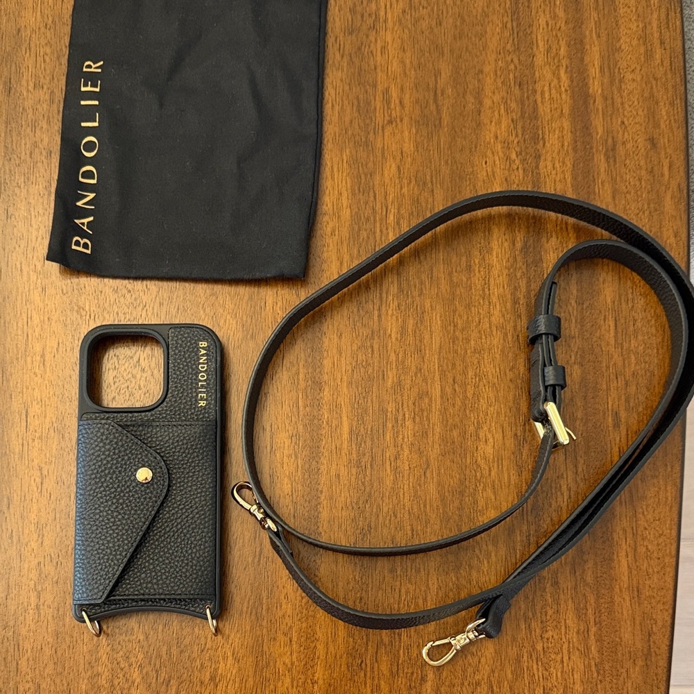 iPhone 16 Pro Bandolier Phone Case (black, gold hardware)